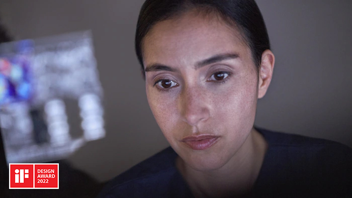 Technologist using AI enabled control room solution efficiently planning an MR exam