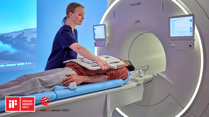 Technologist saving time preparing patient for an MR imaging exam with easy workflow